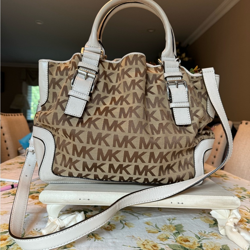 Michael Kors ivory leather signature handbag . Short handle and long strap